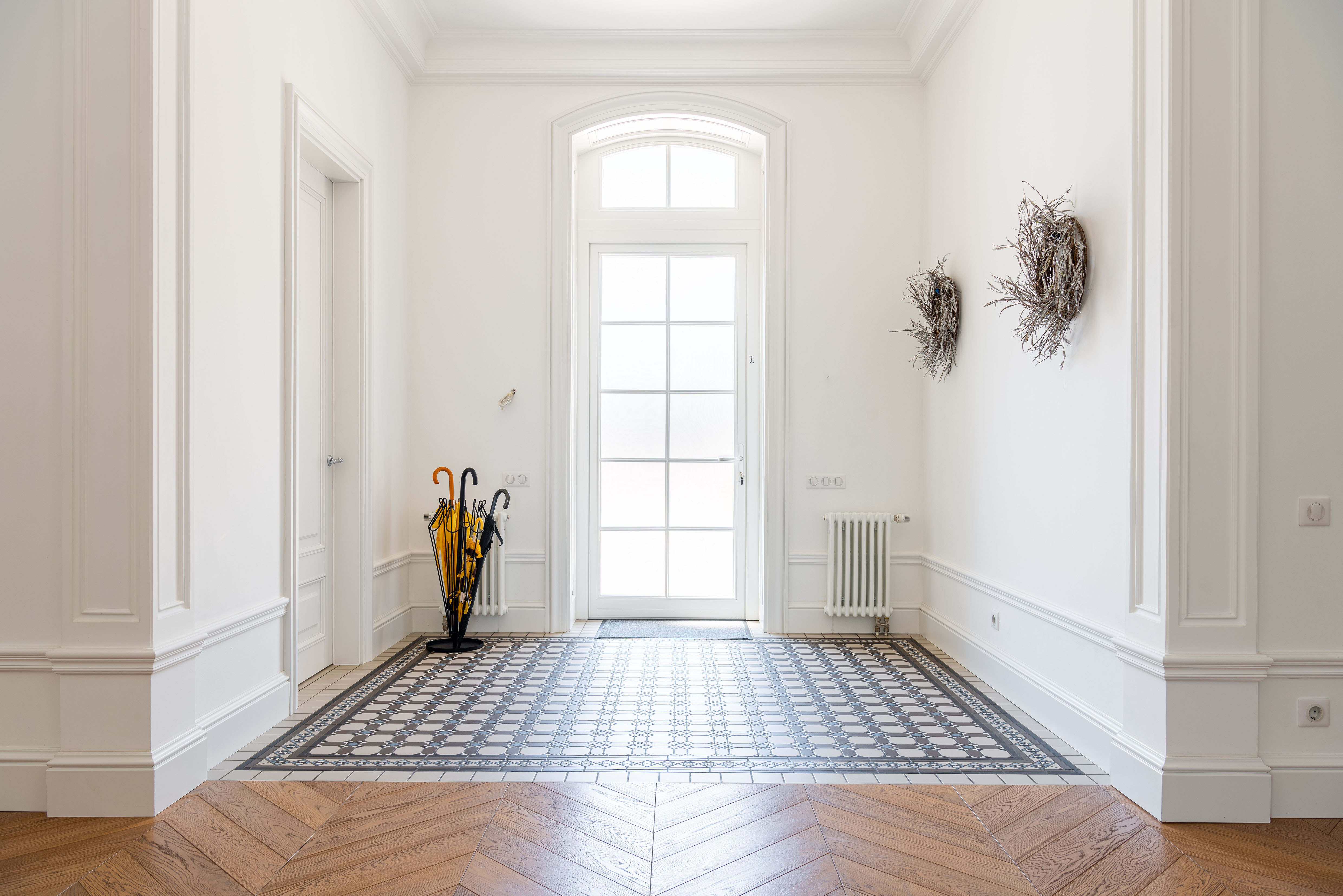 Painter applying a fresh coat in a residential interior — careful preparation by Fresh Effects