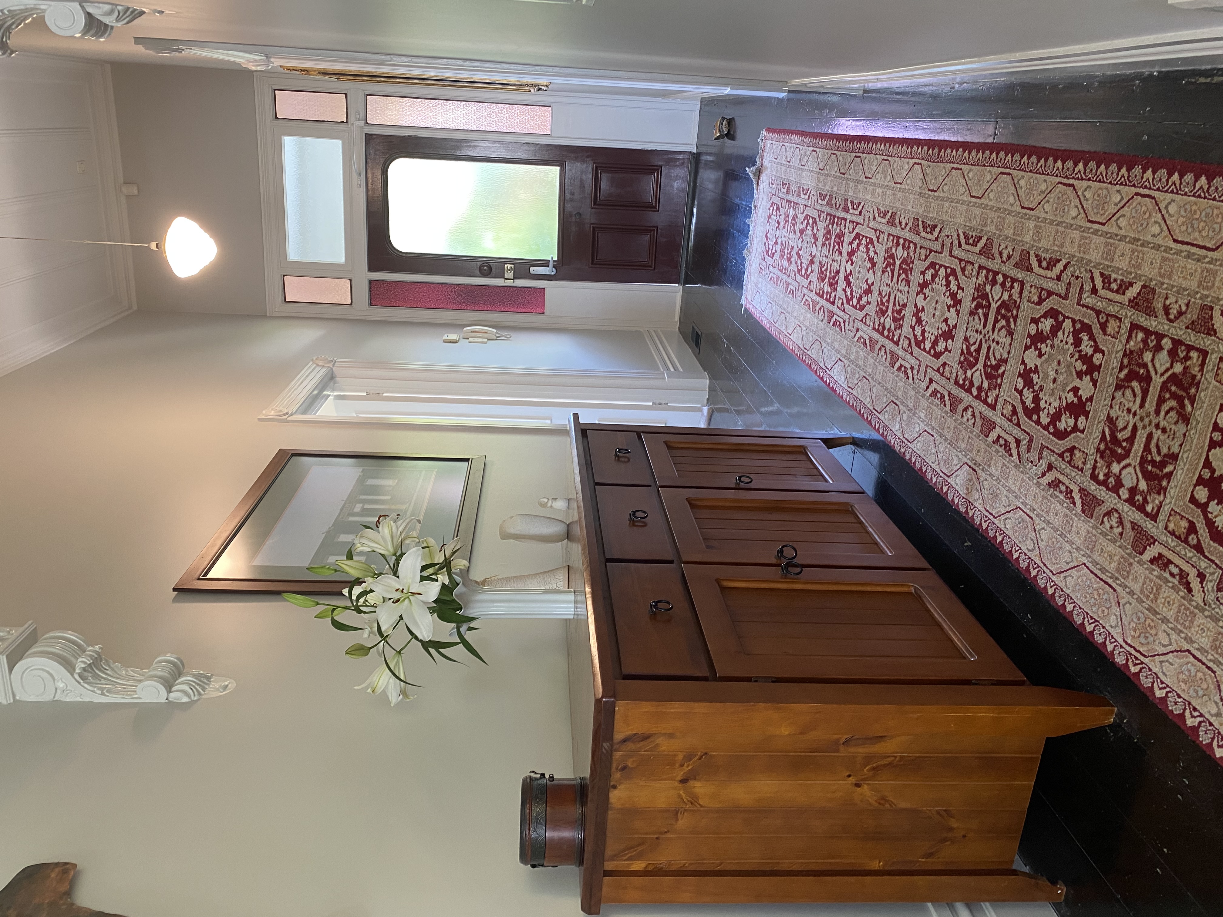 Restored villa interior with period features — window repair and repaint